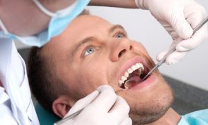 یکب از راه‌های جلوگیری از پوسیدگی دندان جرم گیری سالیانه است.