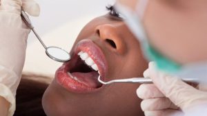 عوارض پر كردن دندان چیست